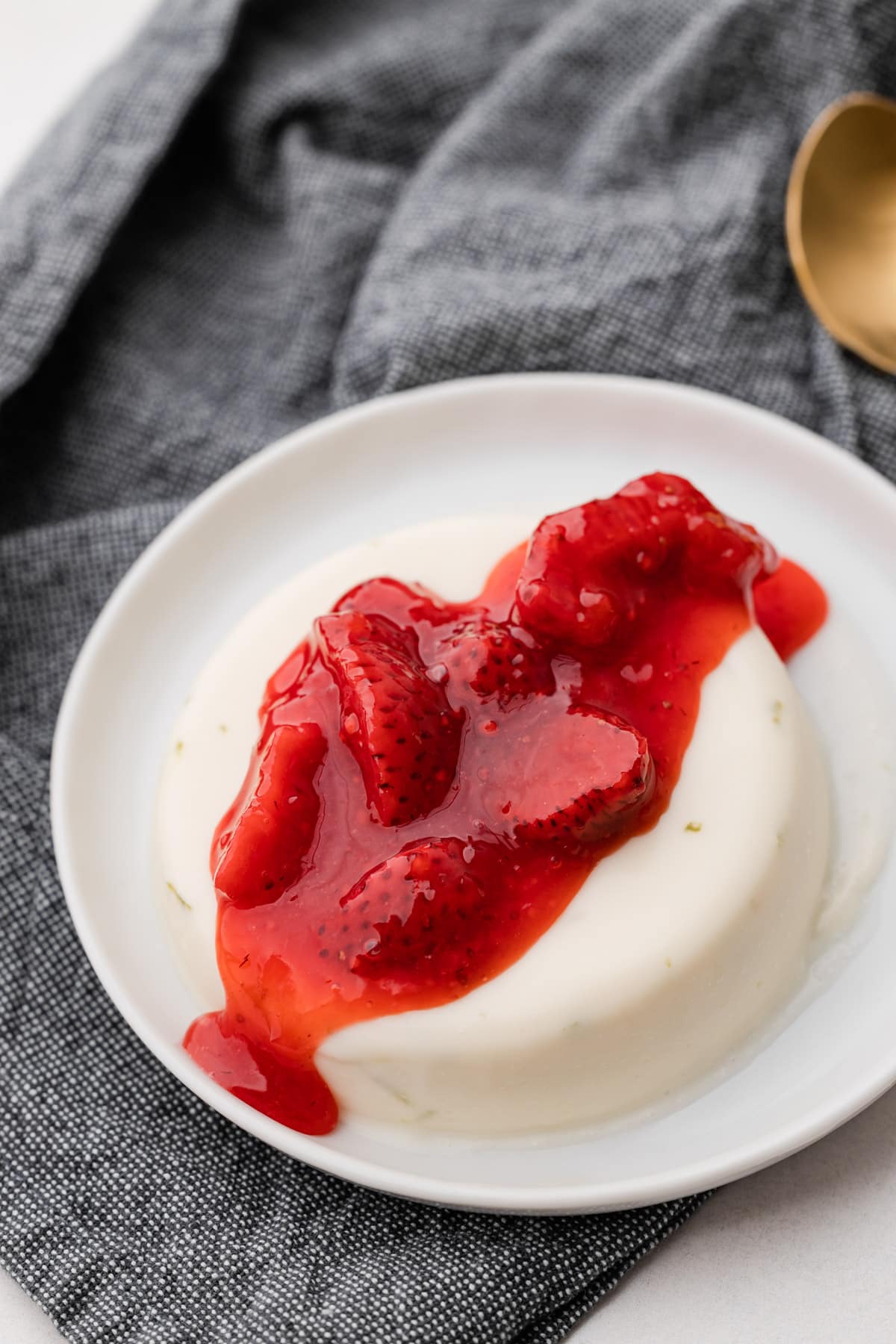 Strawberry pie topping on panna cotta.