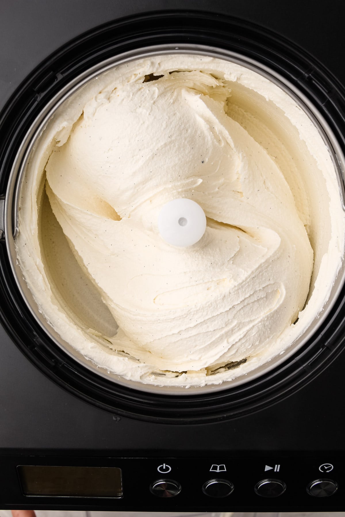 Churning vanilla bean ice cream.