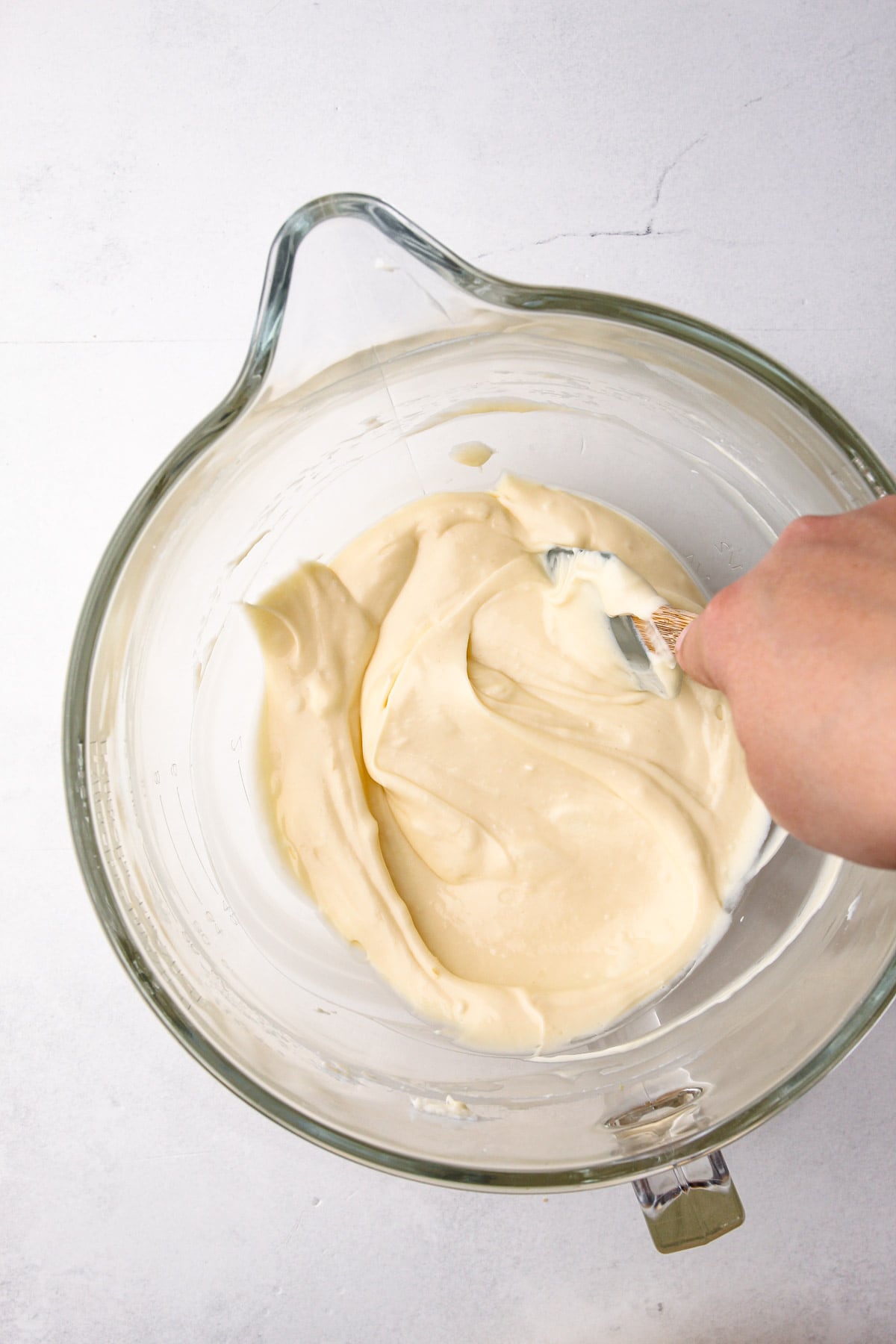 Making the cheesecake filling.