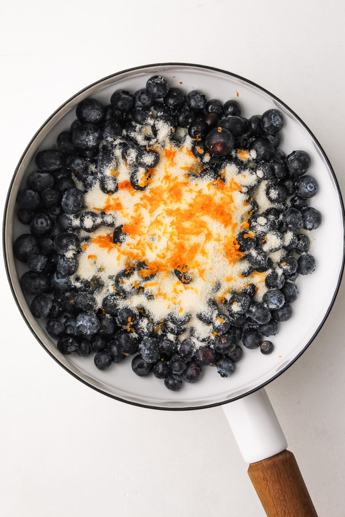 Blueberries in a white pot.