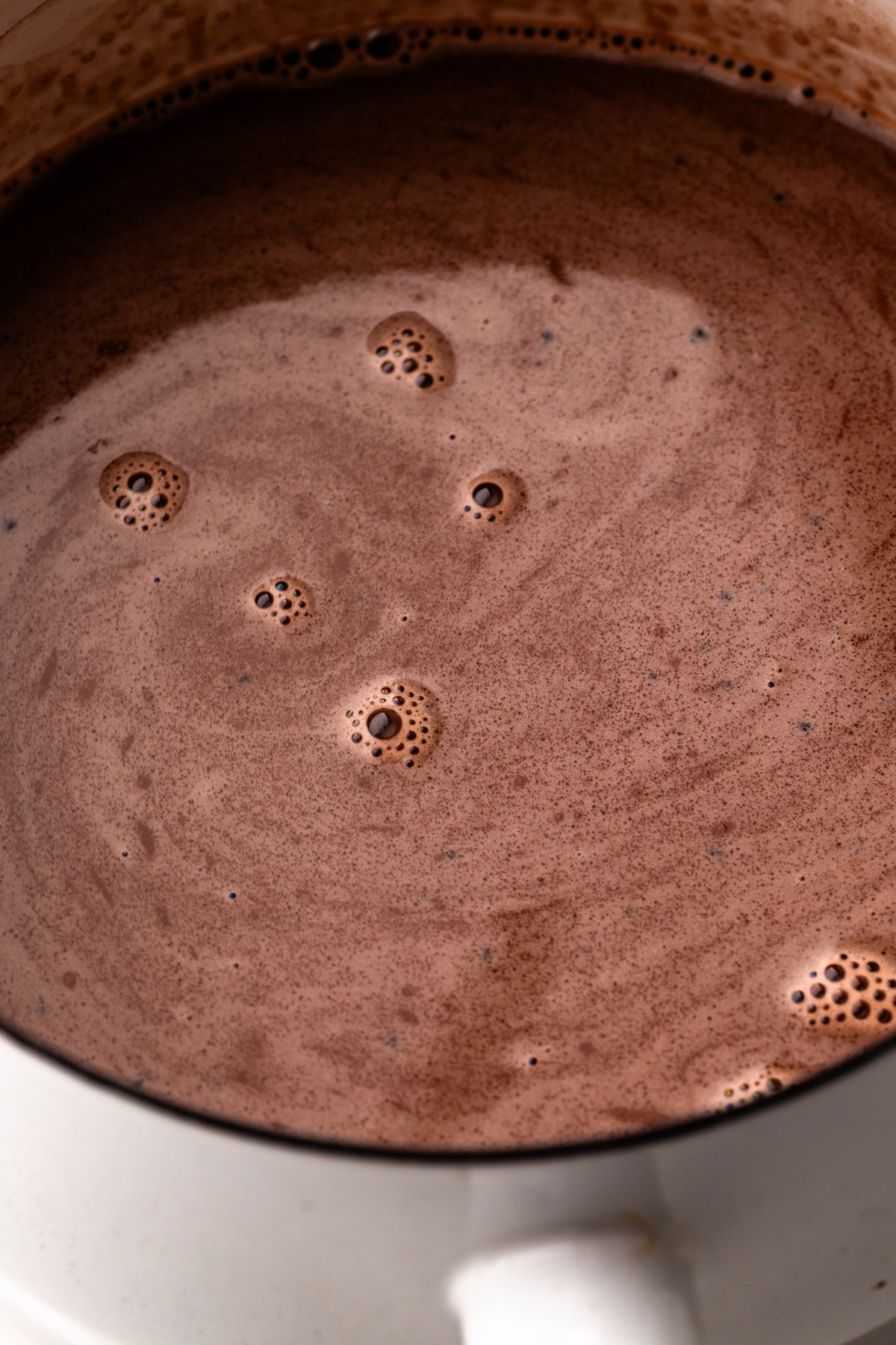 Chocolate ice cream base in a pot.