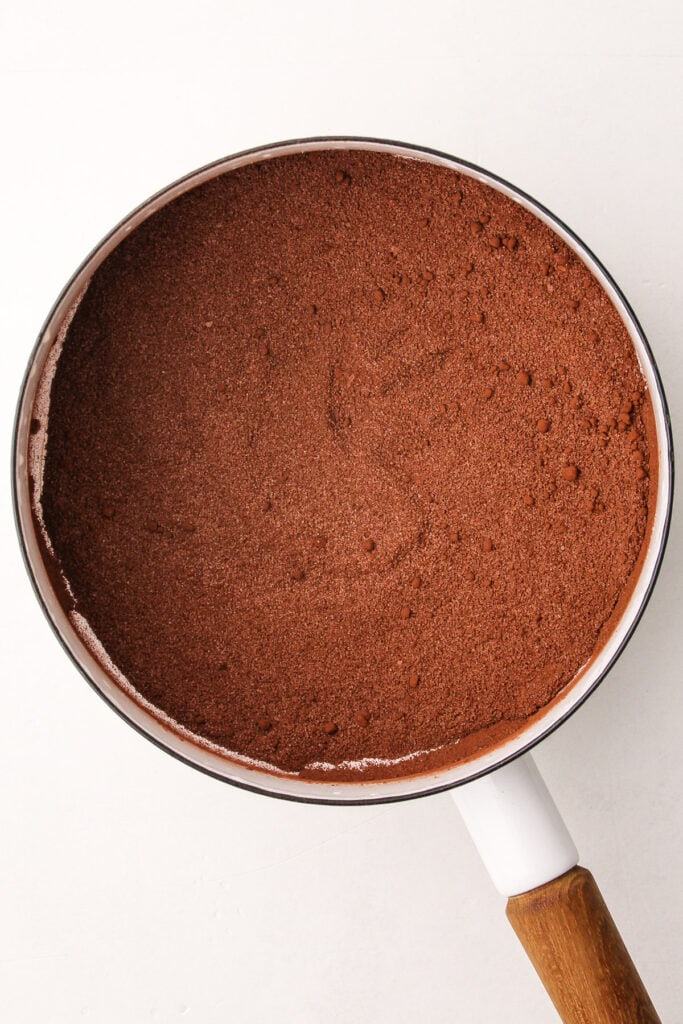 Cocoa powder in a pot to make chocolate ice cream.