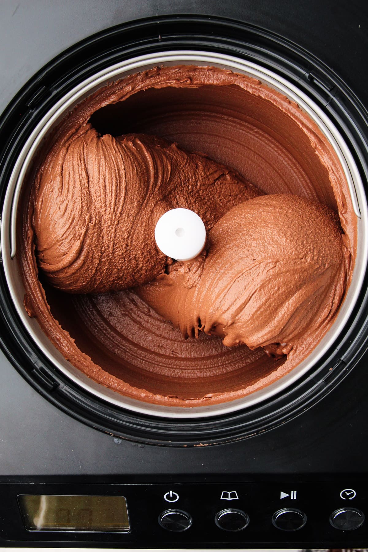 Churning chocolate ice cream.