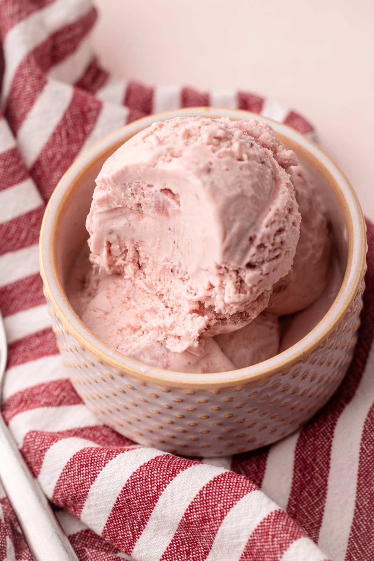 A serving of strawberry ice cream.