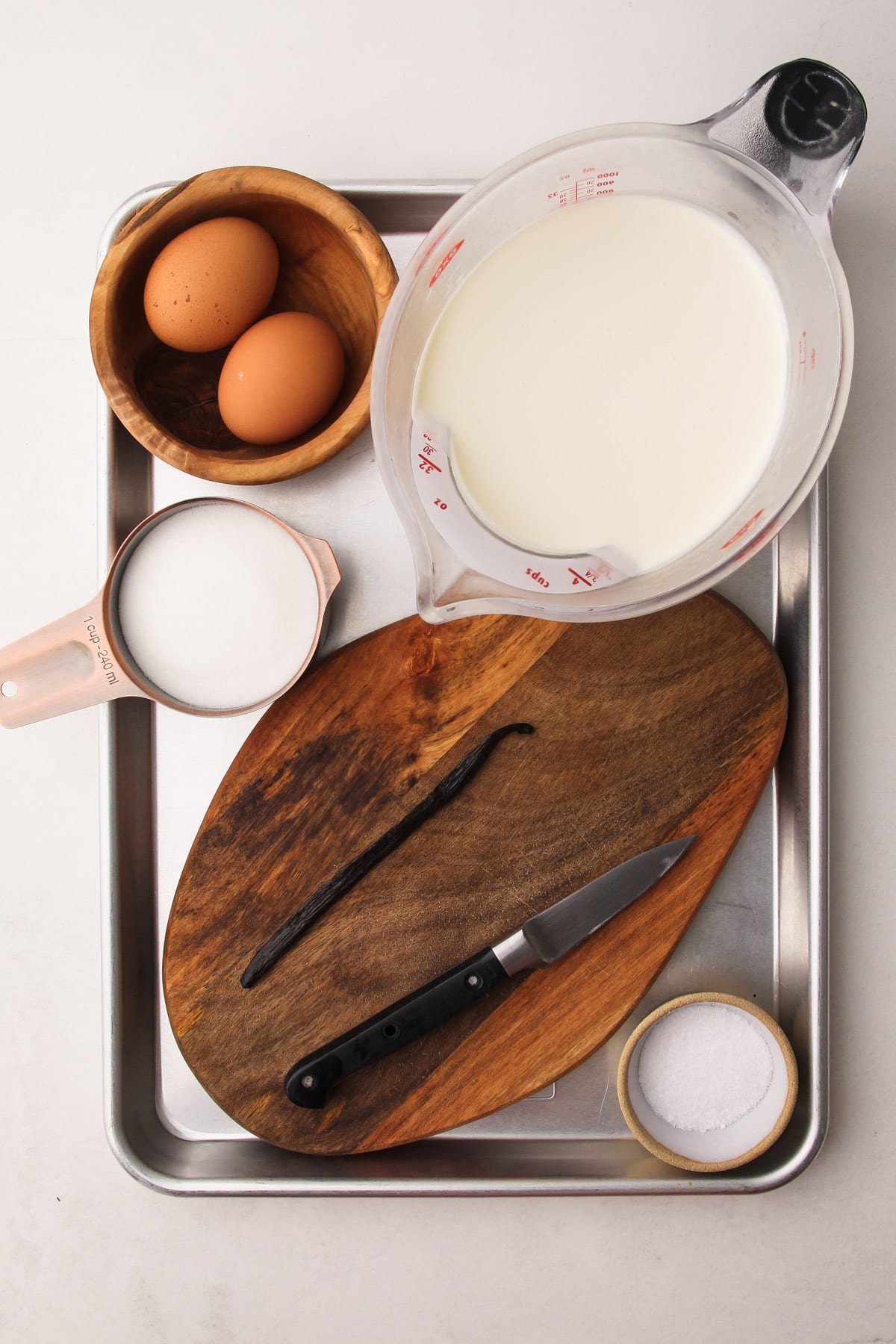 Ingredients for vanilla bean ice cream.