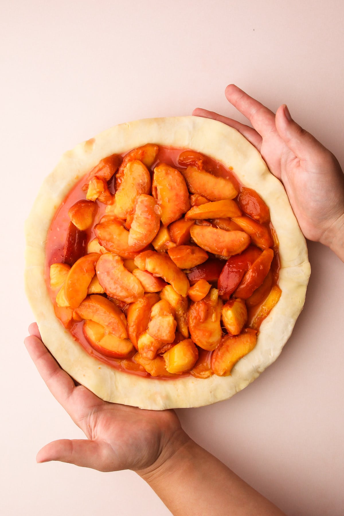 Peach pie filling in a pie crust.