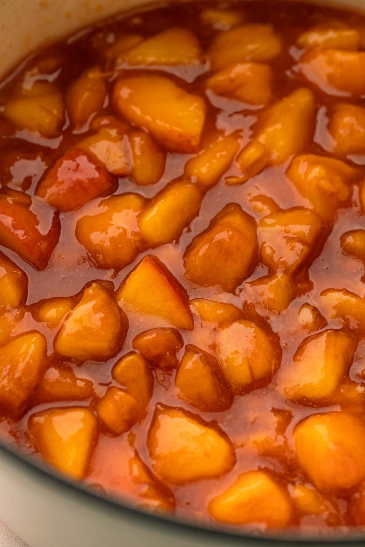 Peach pie filling in a pot.