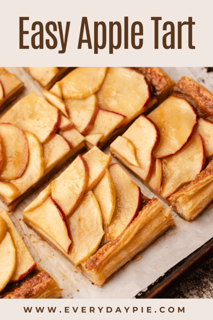 A sliced apple tart made on puff pastry.