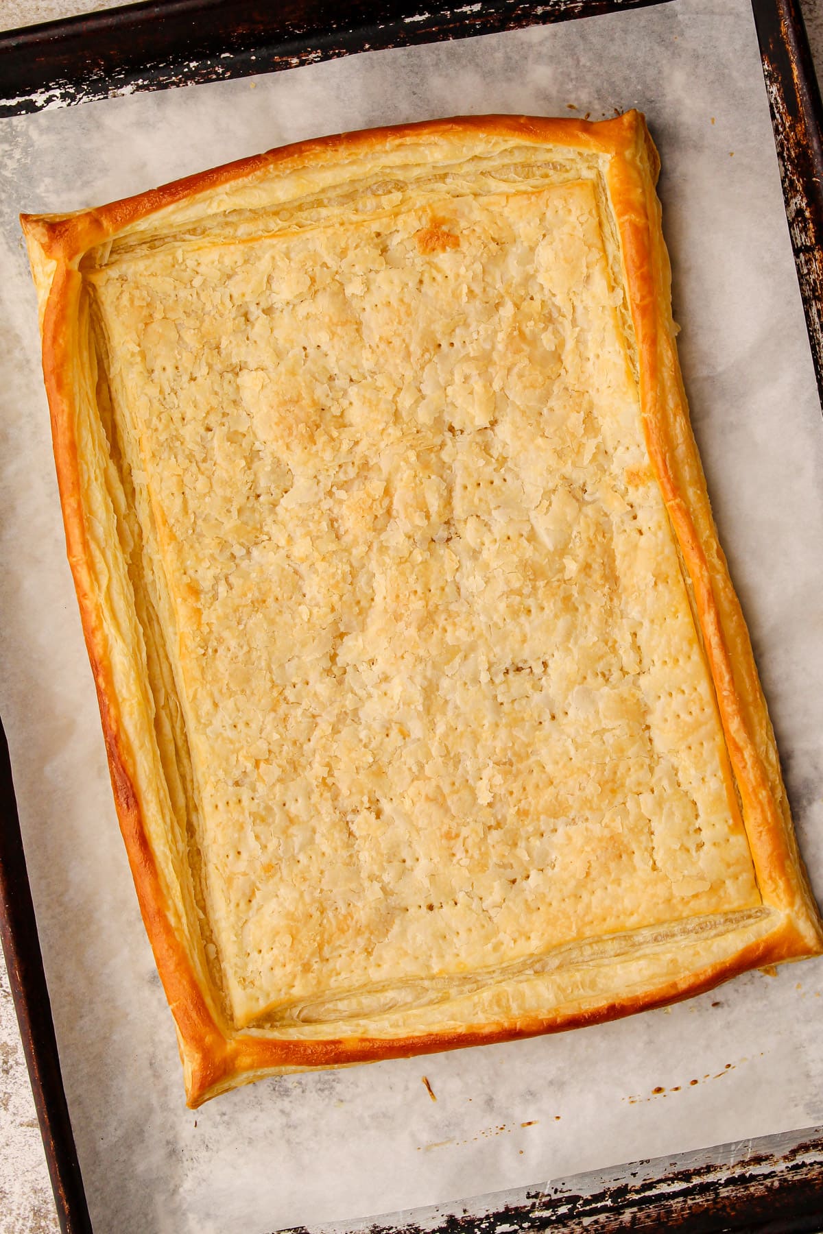 Fully blind baked puff pastry.