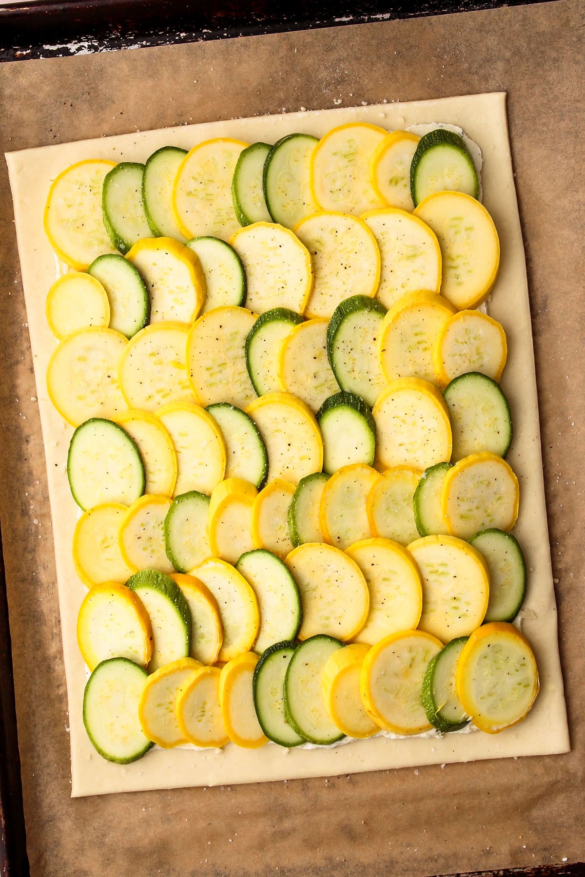 An unbaked zucchini tart.