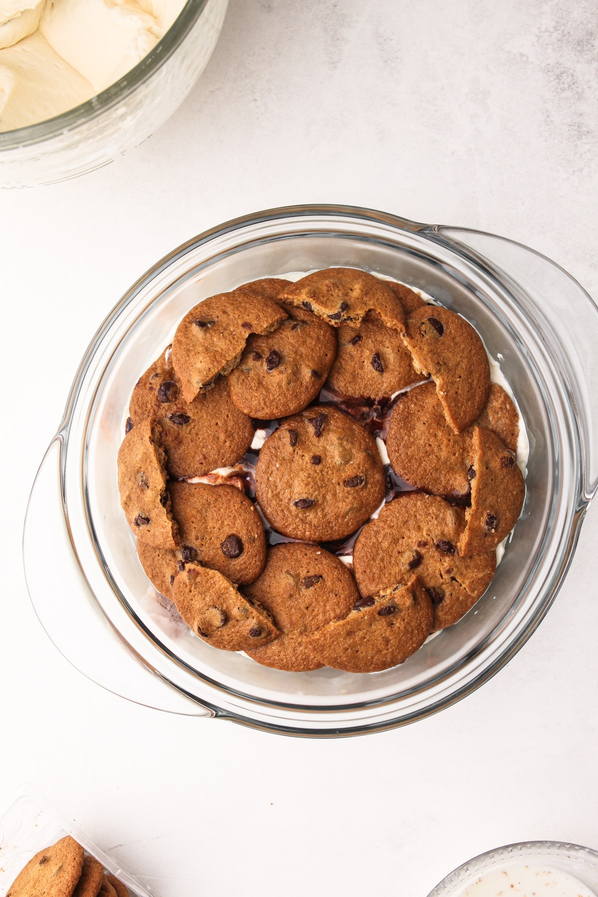 A second cookie layer in the icebox cake as it is assembled.