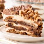 A close up slice view of the cookies and milk icebox cake.