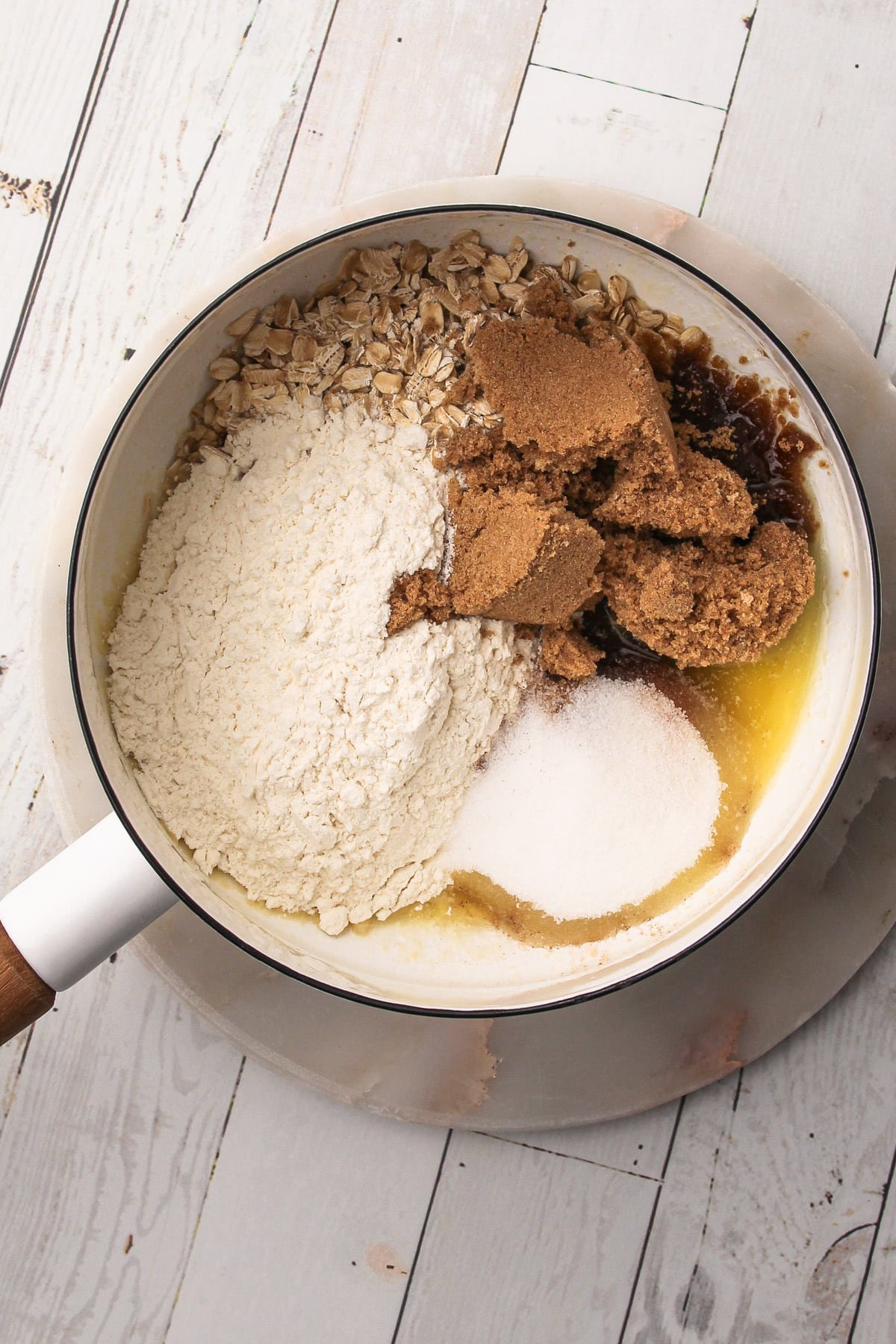 The streusel ingredients in a white pot before being mixed together.