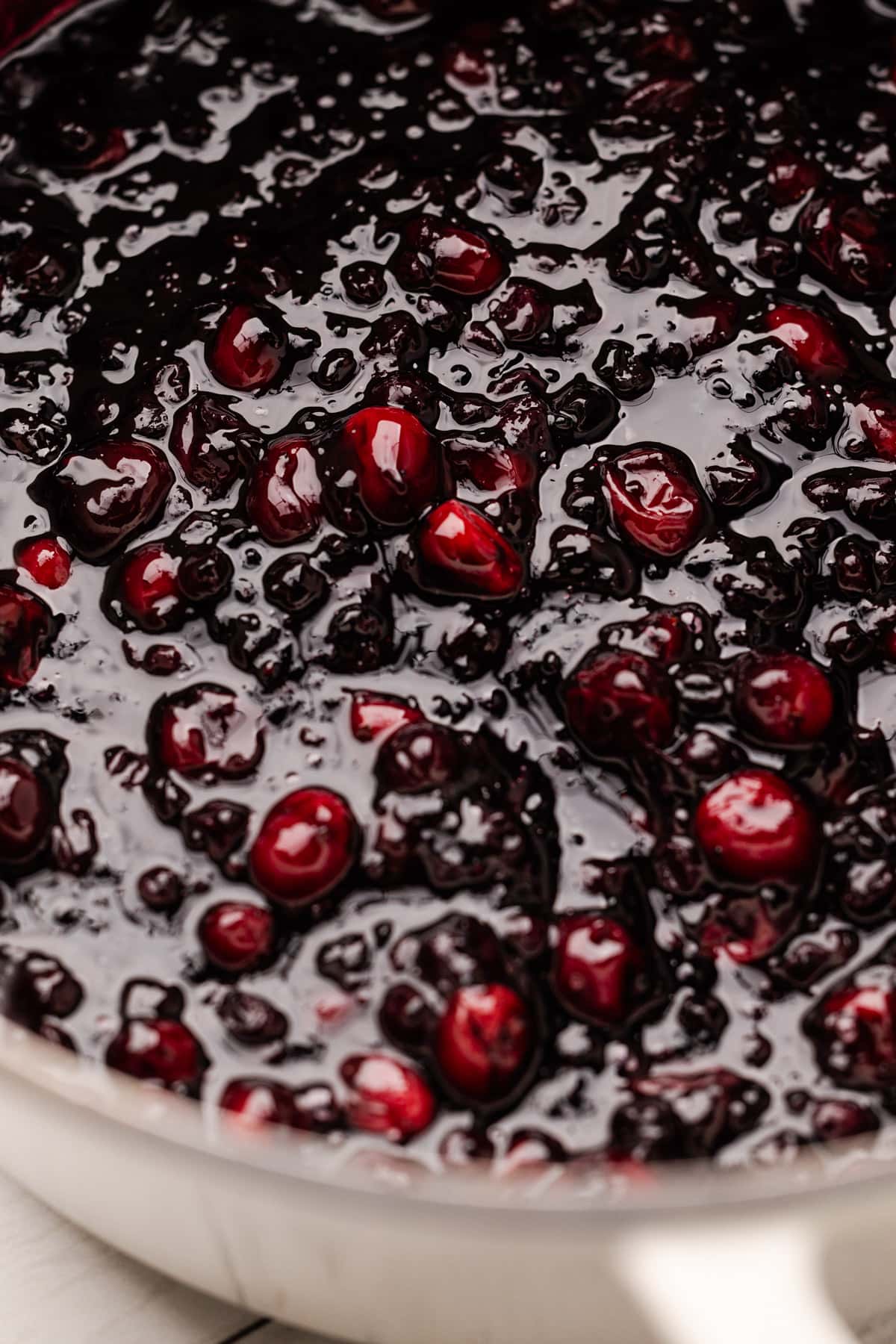 Cooking blueberry cranberry filling.
