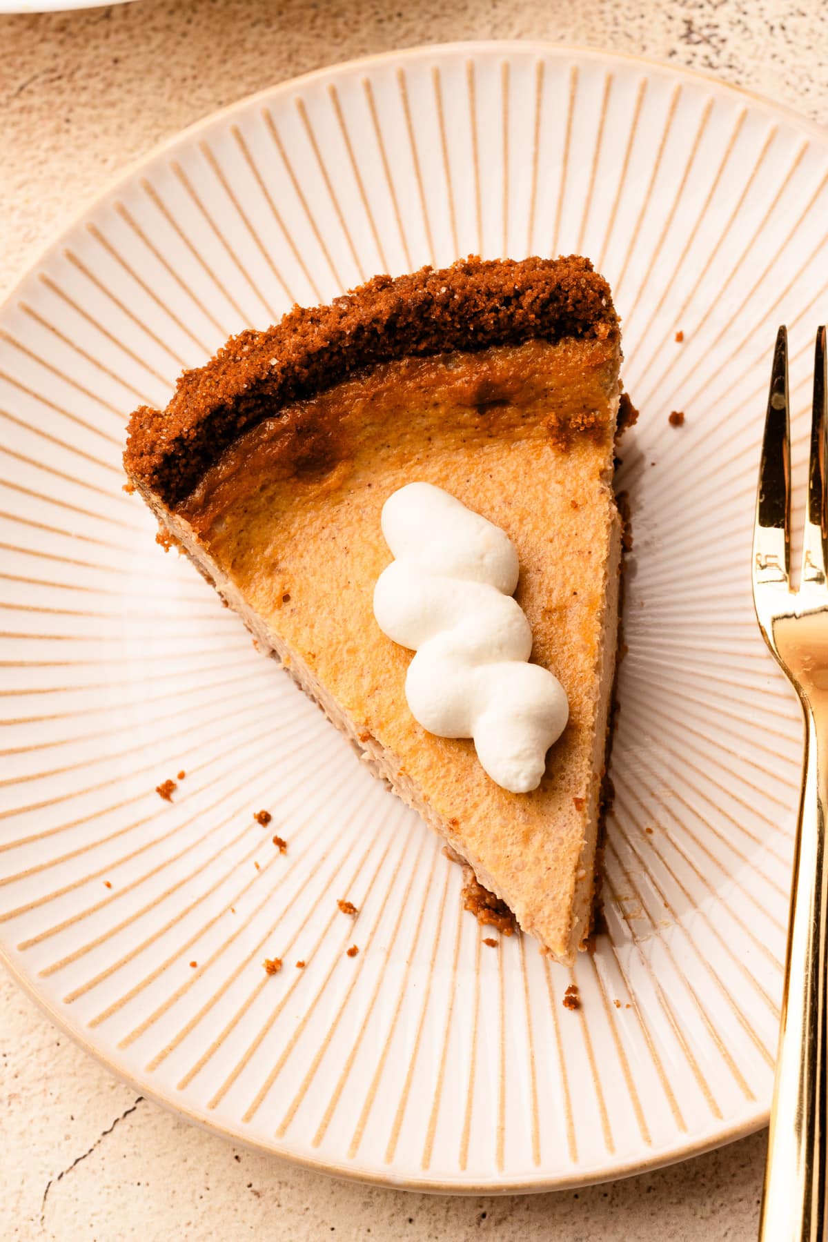 A slice of baked Cinnamon Pie on a plate with a fork.