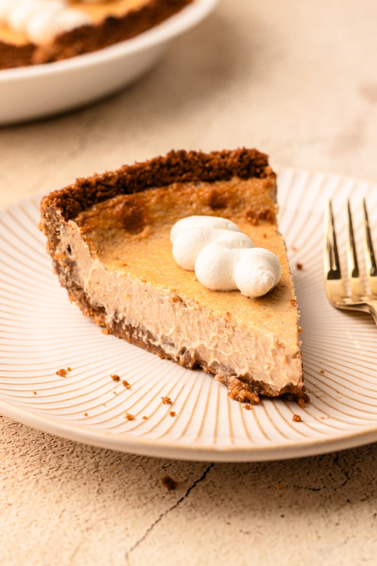 A slice of baked Cinnamon Pie on a plate with a fork.