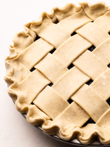 A cream cheese pie crust made into a lattice.