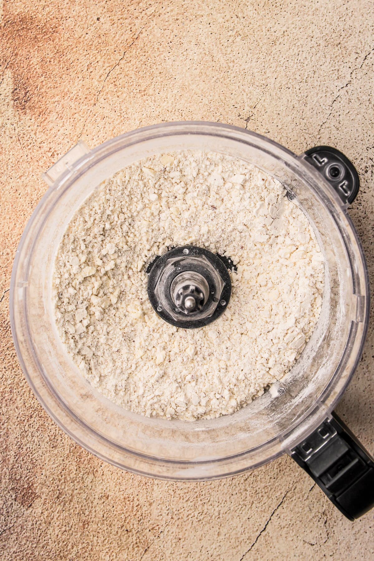 Making a pie crust in a food processor.