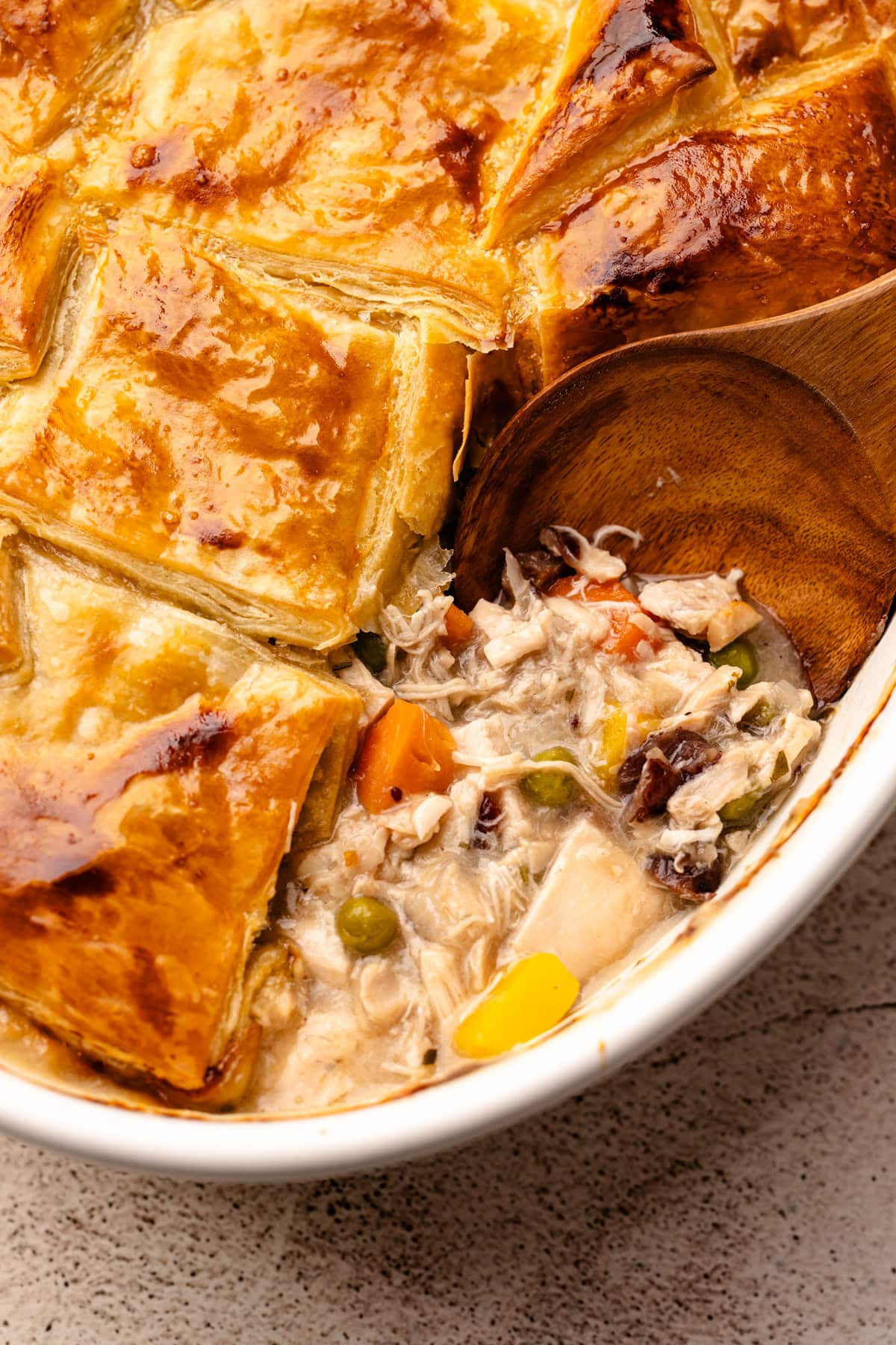 A baked turkey pot pie using puff pastry.