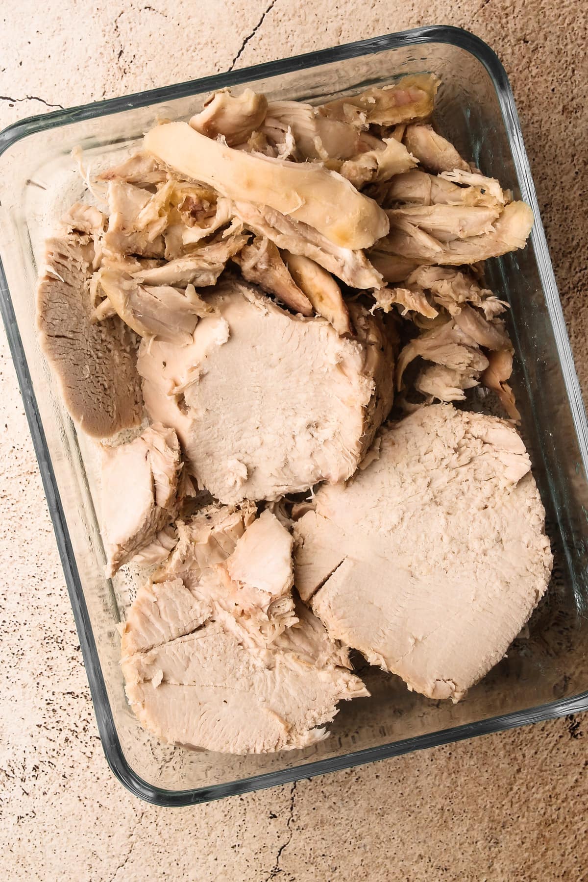 Leftover turkey in a glass container.