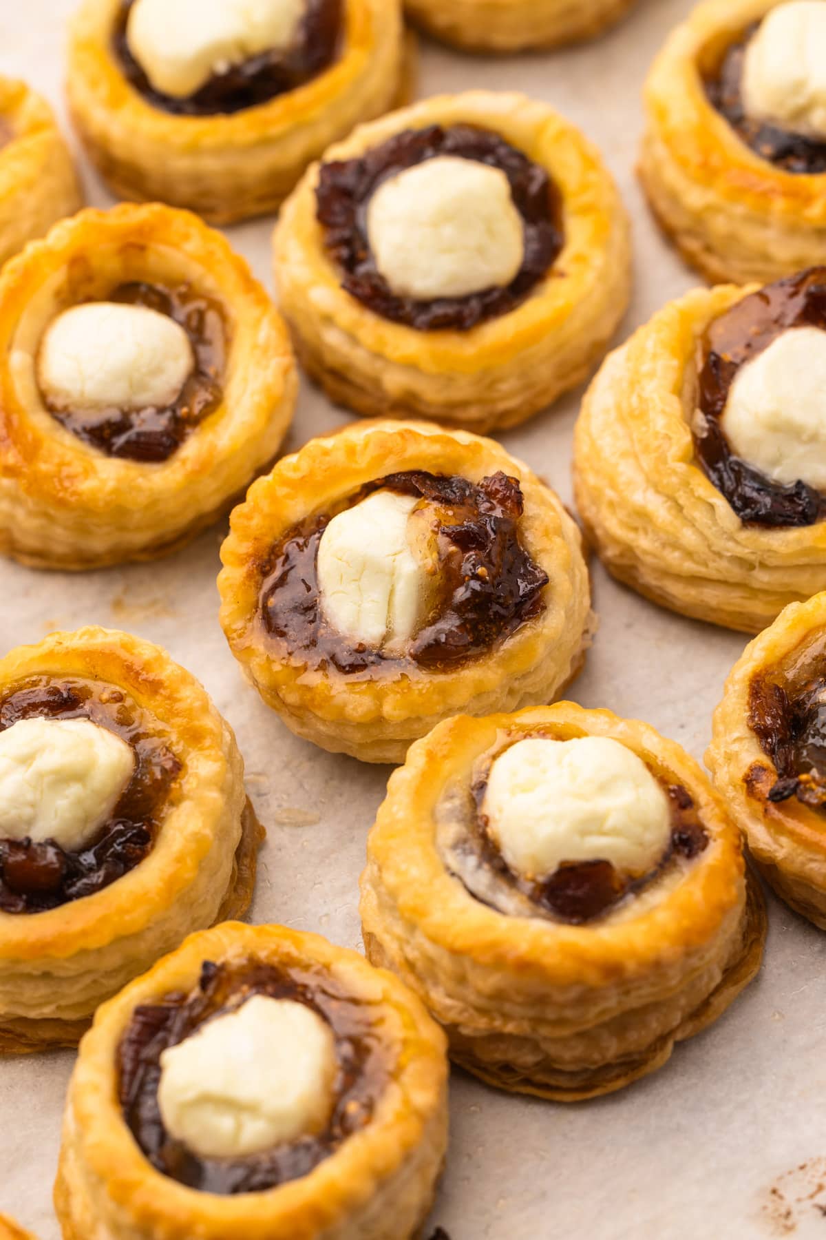 Baked puff pastry goat cheese and fig tartlets.