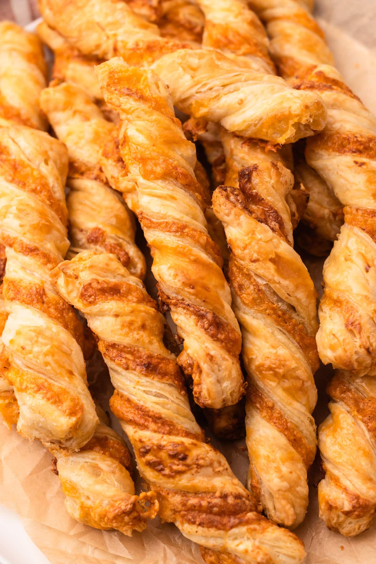 Baked puff pastry cheese twists.