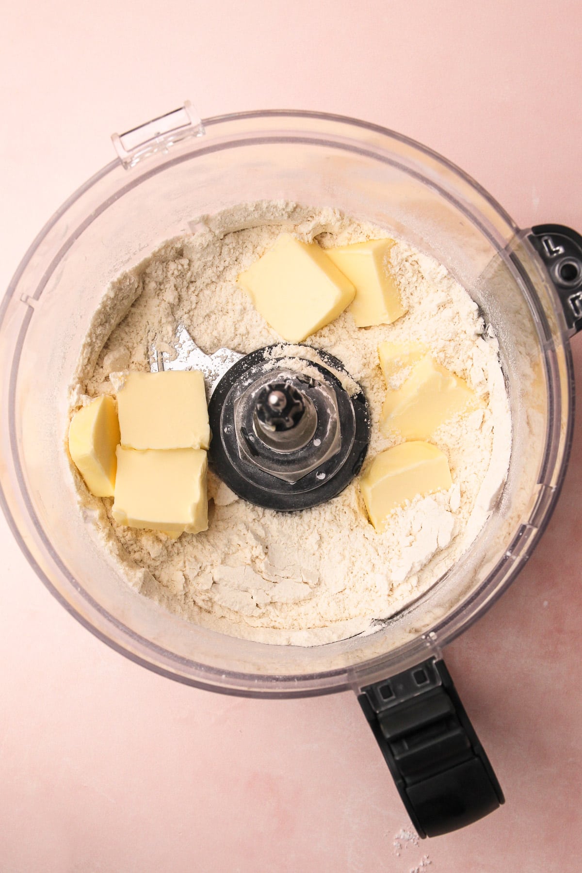 Ingredients for pate sablee in a food processor.