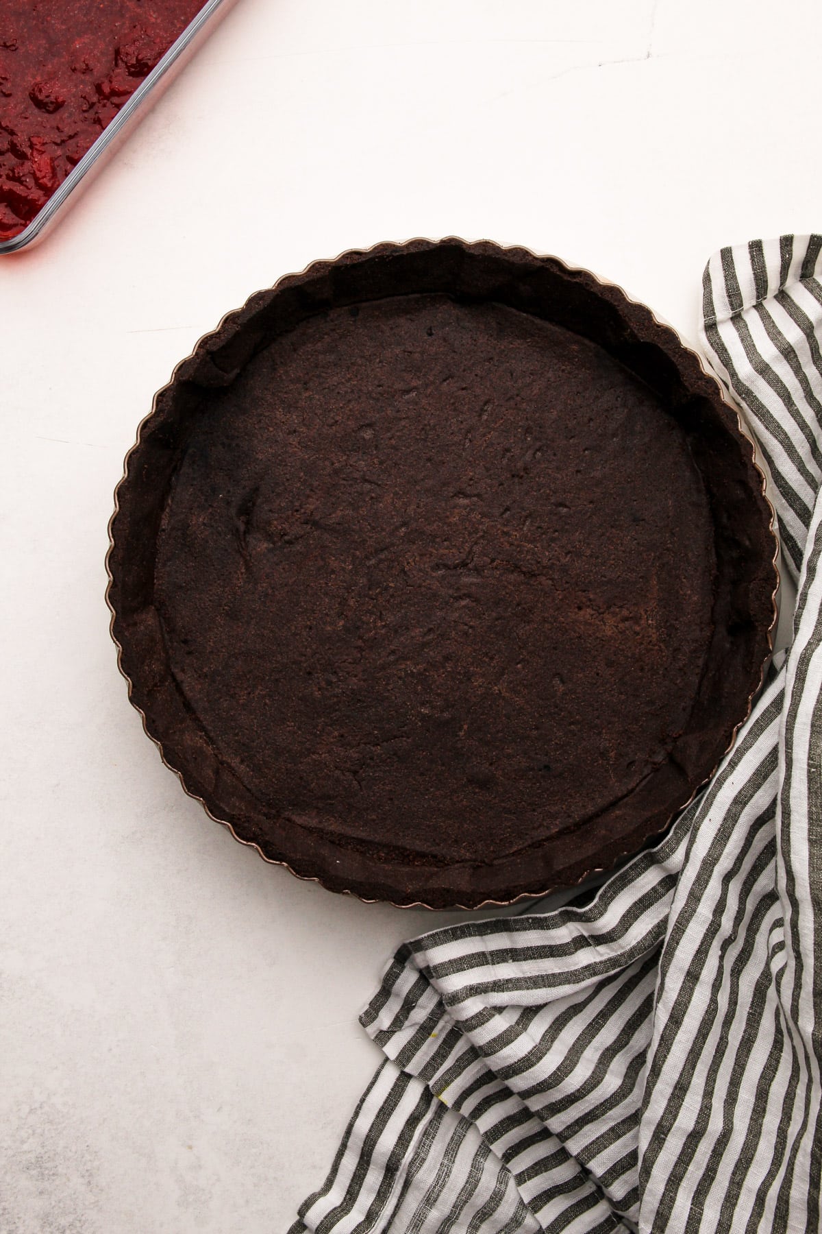 A baked chocolate tart shell for chocolate strawberry pie.