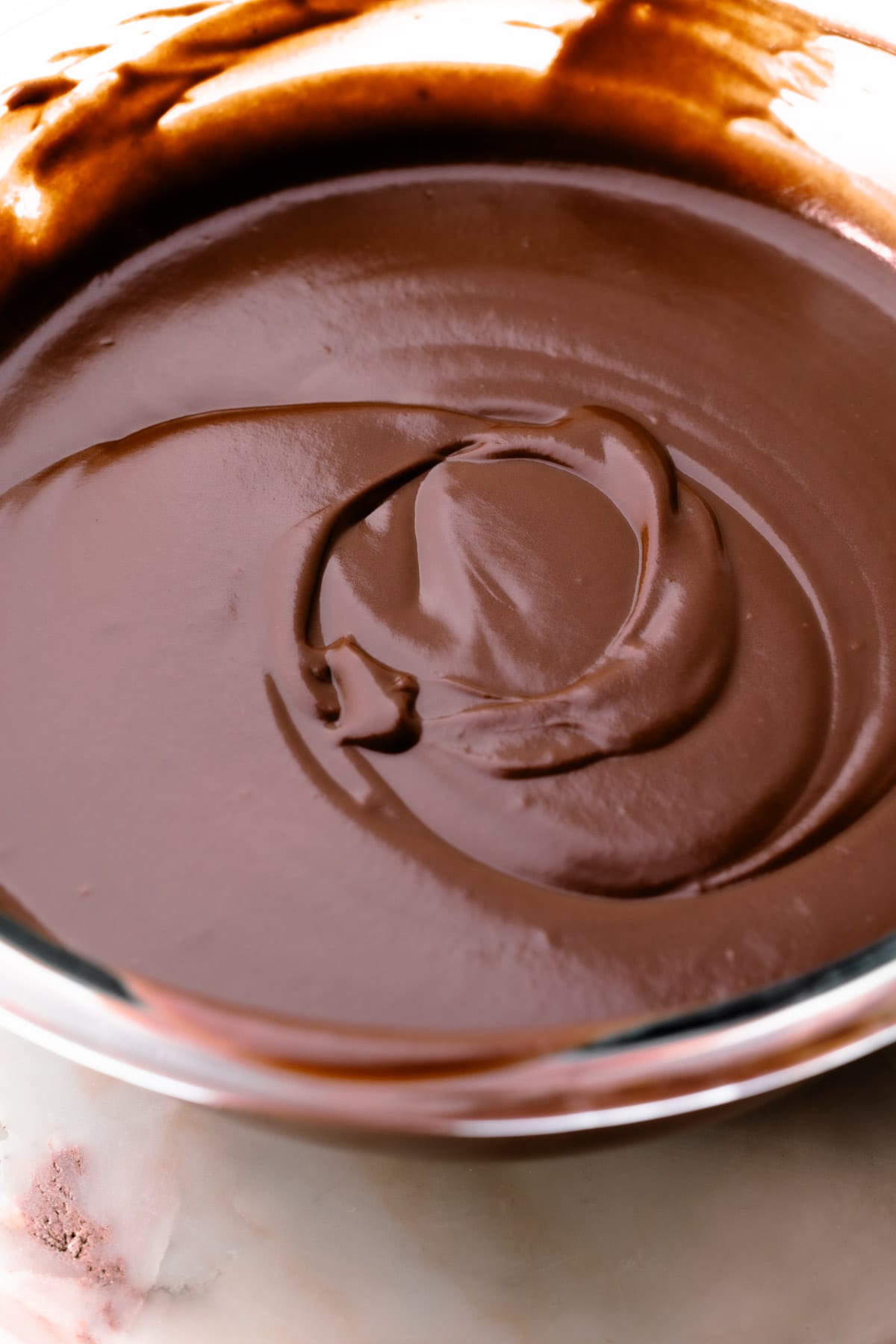 Dark chocolate pudding in a large bowl.