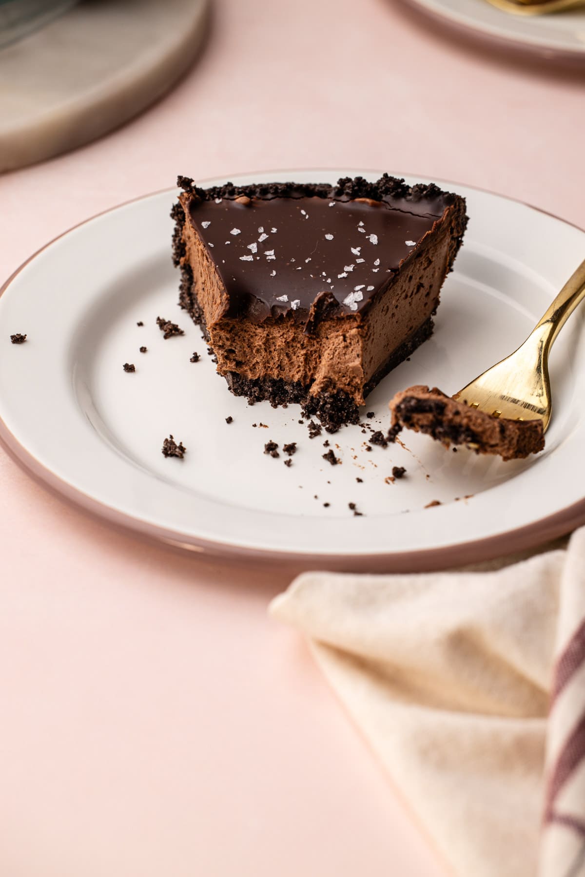 A slice of easy chocolate pie on a plate with a fork.