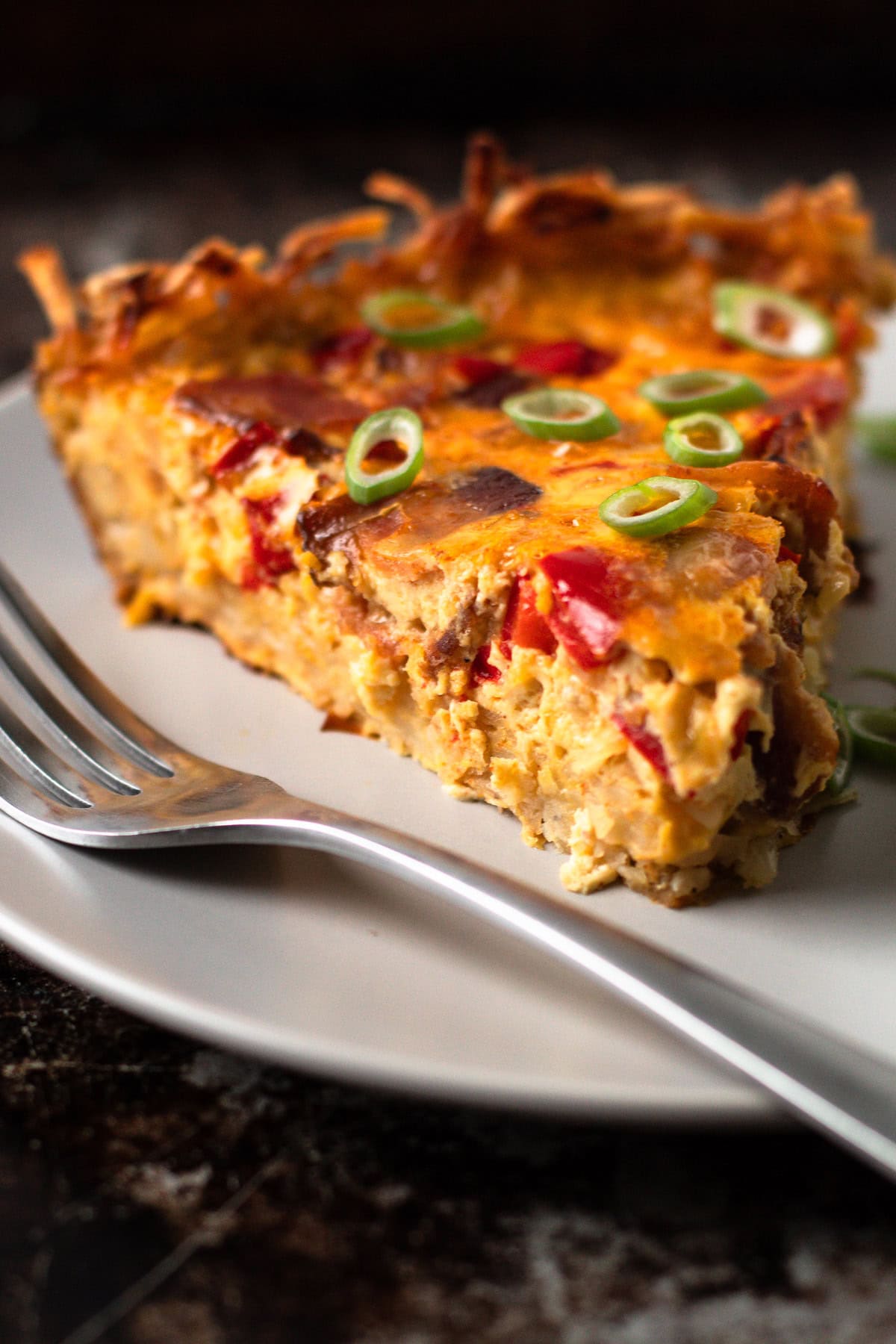 A slice of breakfast pie on a plate.