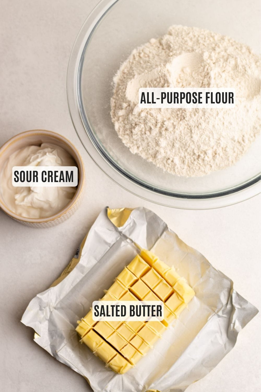 Three ingredients measured out to make a sour cream pie crust.