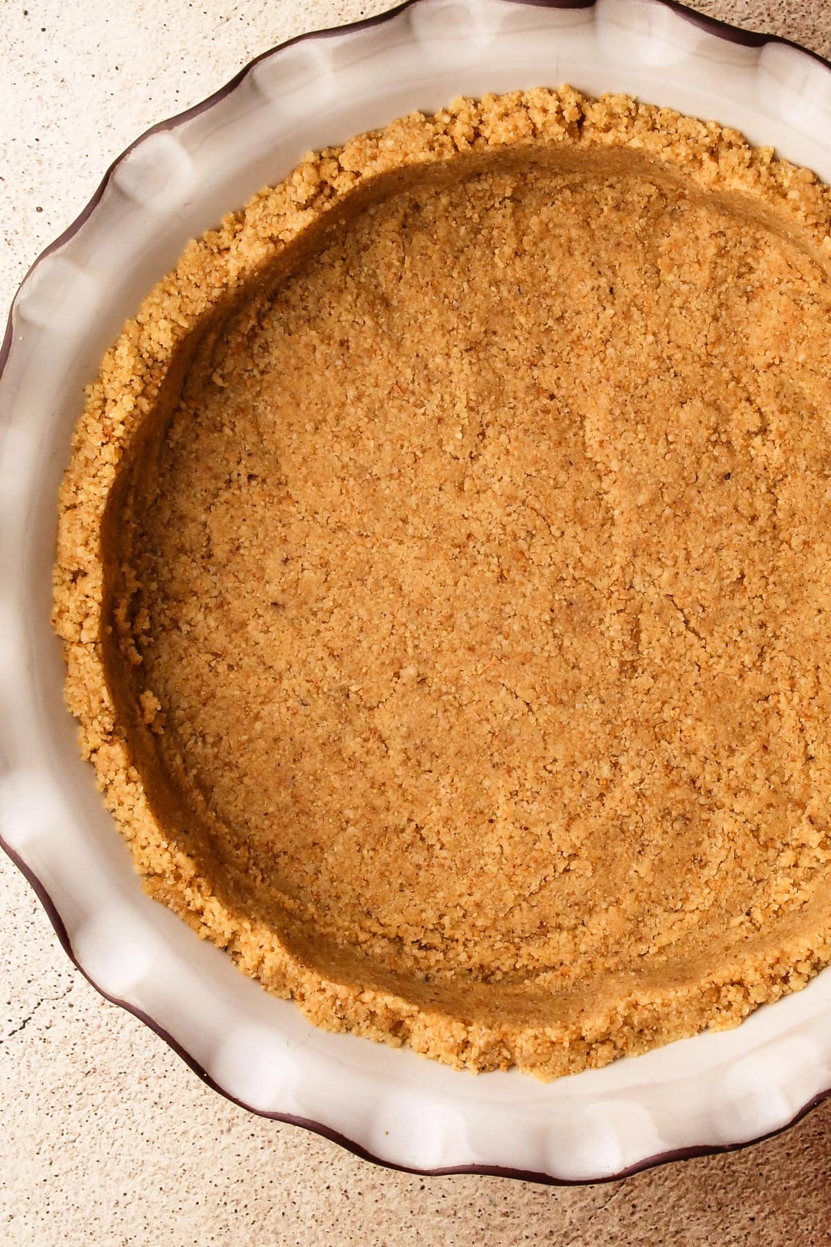 A pie crust made from graham cracker crumbs.