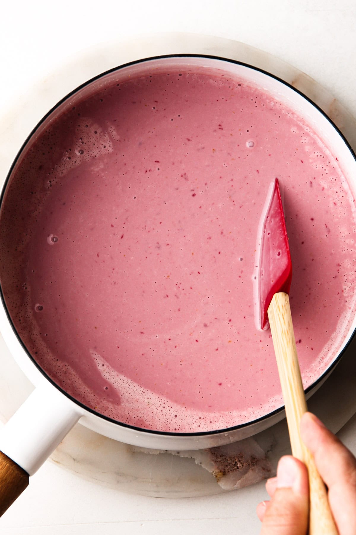 A cherry ice cream custard base in a pot.