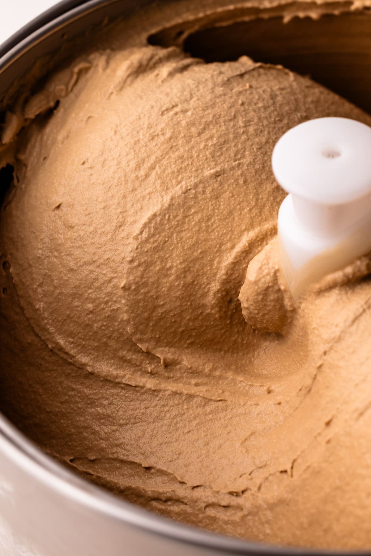 Homemade coffee ice cream in an ice cream spinner.