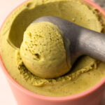 A scoop of pistachio ice cream.