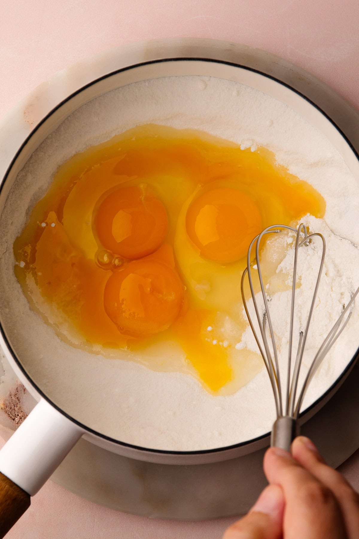 Eggs, cornstarch and sugar in a pot.