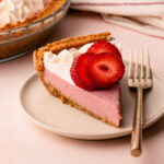 A plated slice of strawberry cream pie.