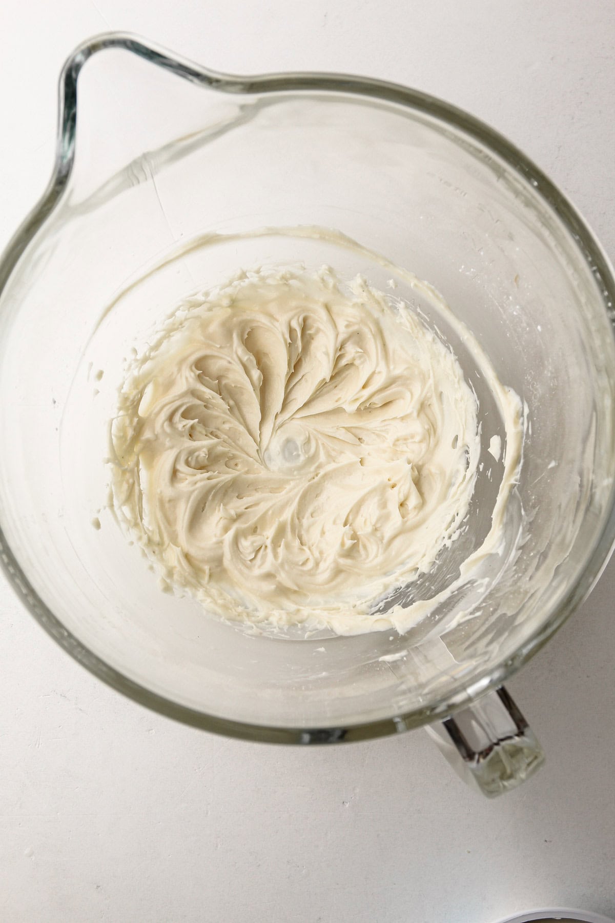 A creamy filling being prepared for fruit tarts.