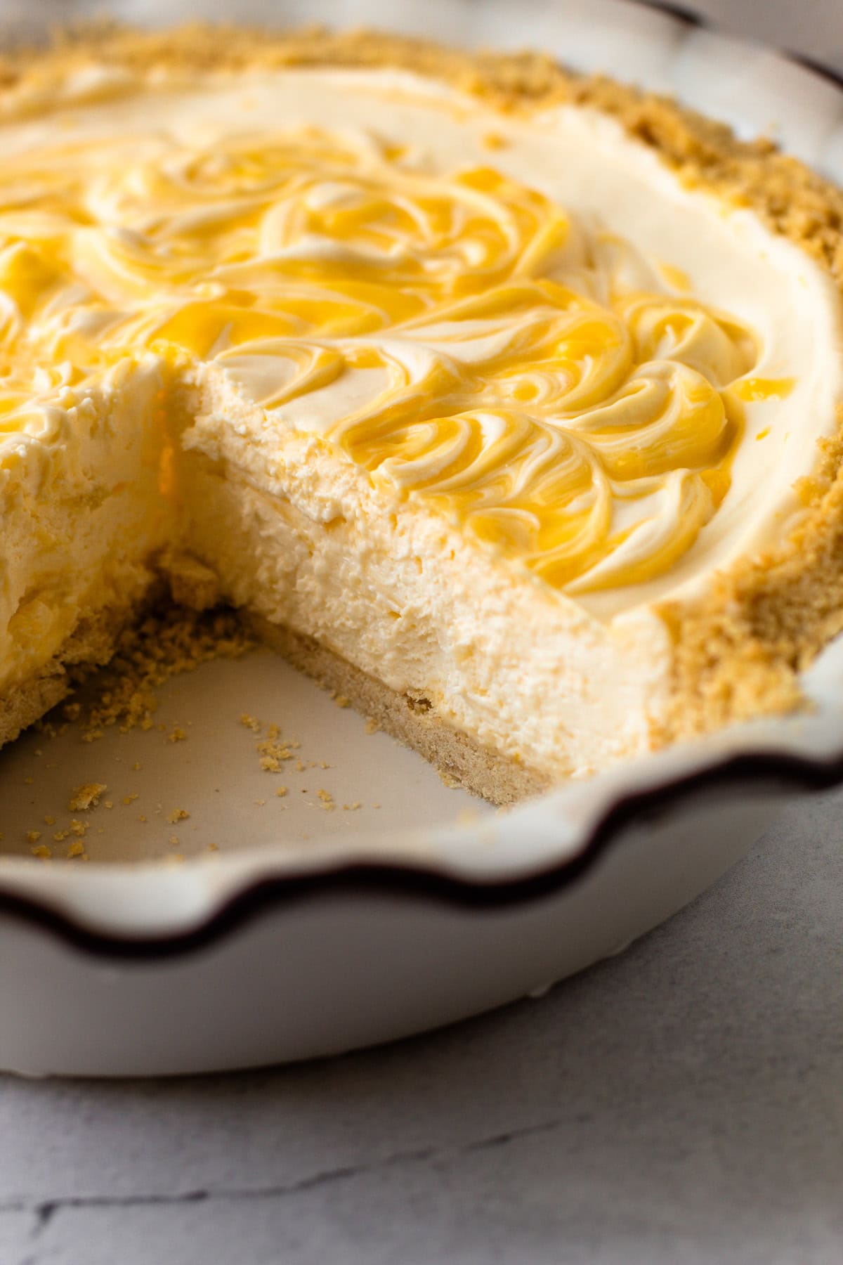 Sliced no bake lemon pie showing the creamy filling.