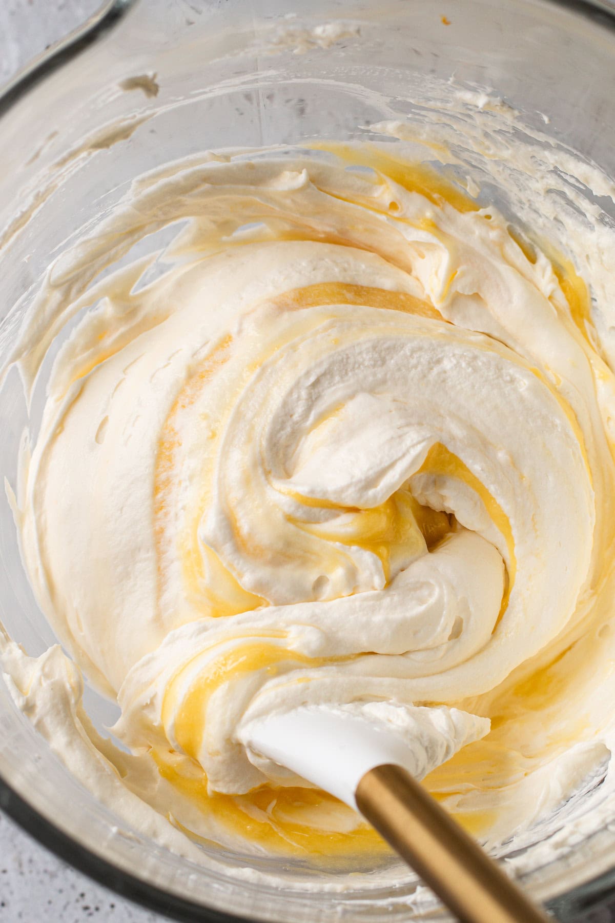 Lemon curd and lemon zest added to a creamy pie filling mixture.