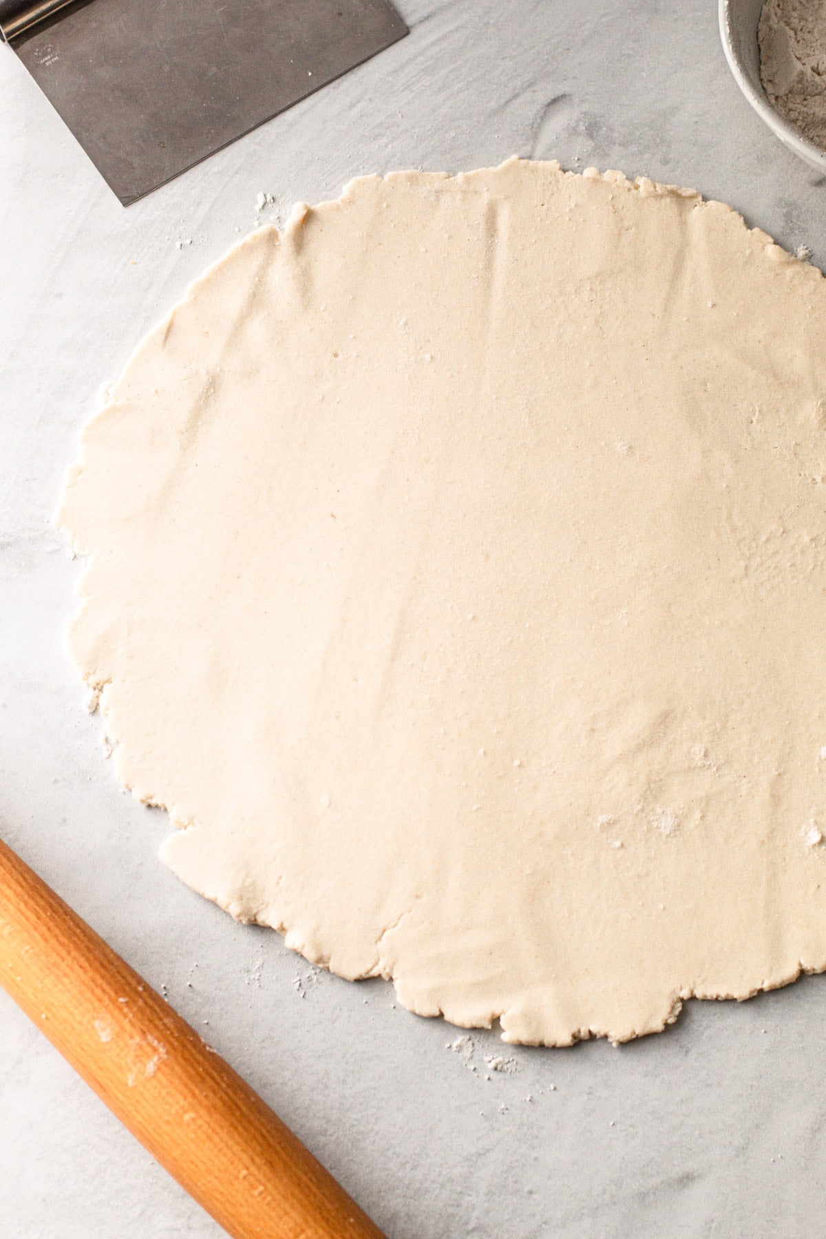 A gluten free pie crust rolled out.