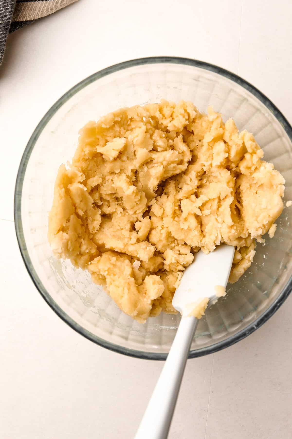 The raw dough for a melted butter pie crust.