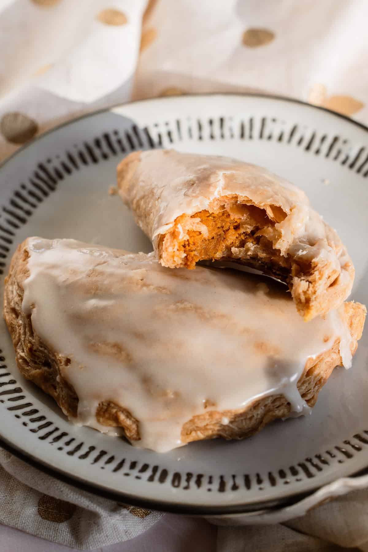 A baked and glazed harry potter inspired pumpkin pasty.