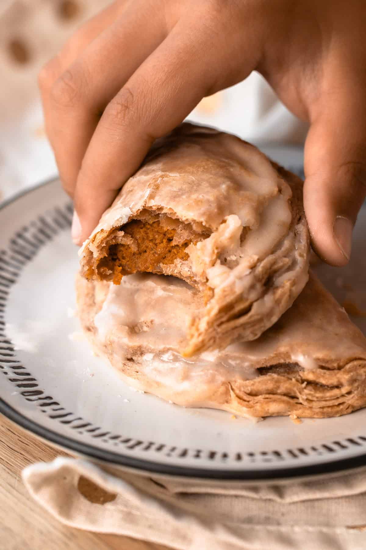 A baked and glazed harry potter inspired pumpkin pasty.