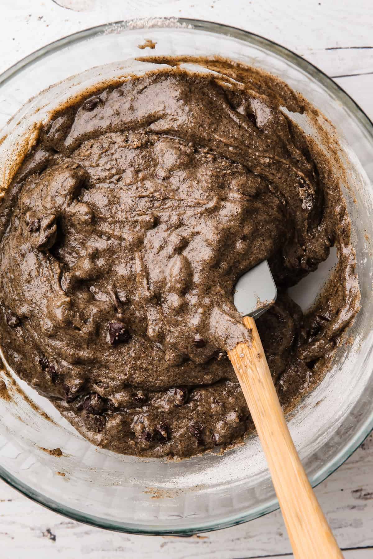 Fully mixed oat buckwheat chocolate chip cookie dough with chocolate chips.