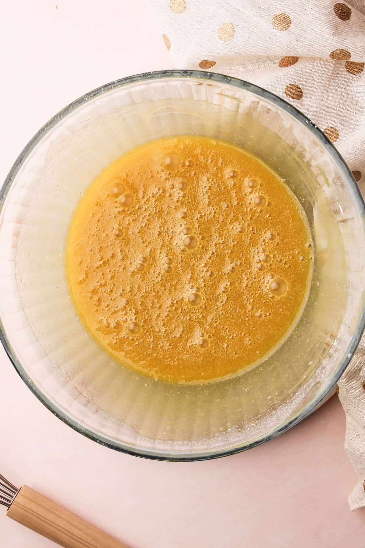 Preparing batter for pizzelles.