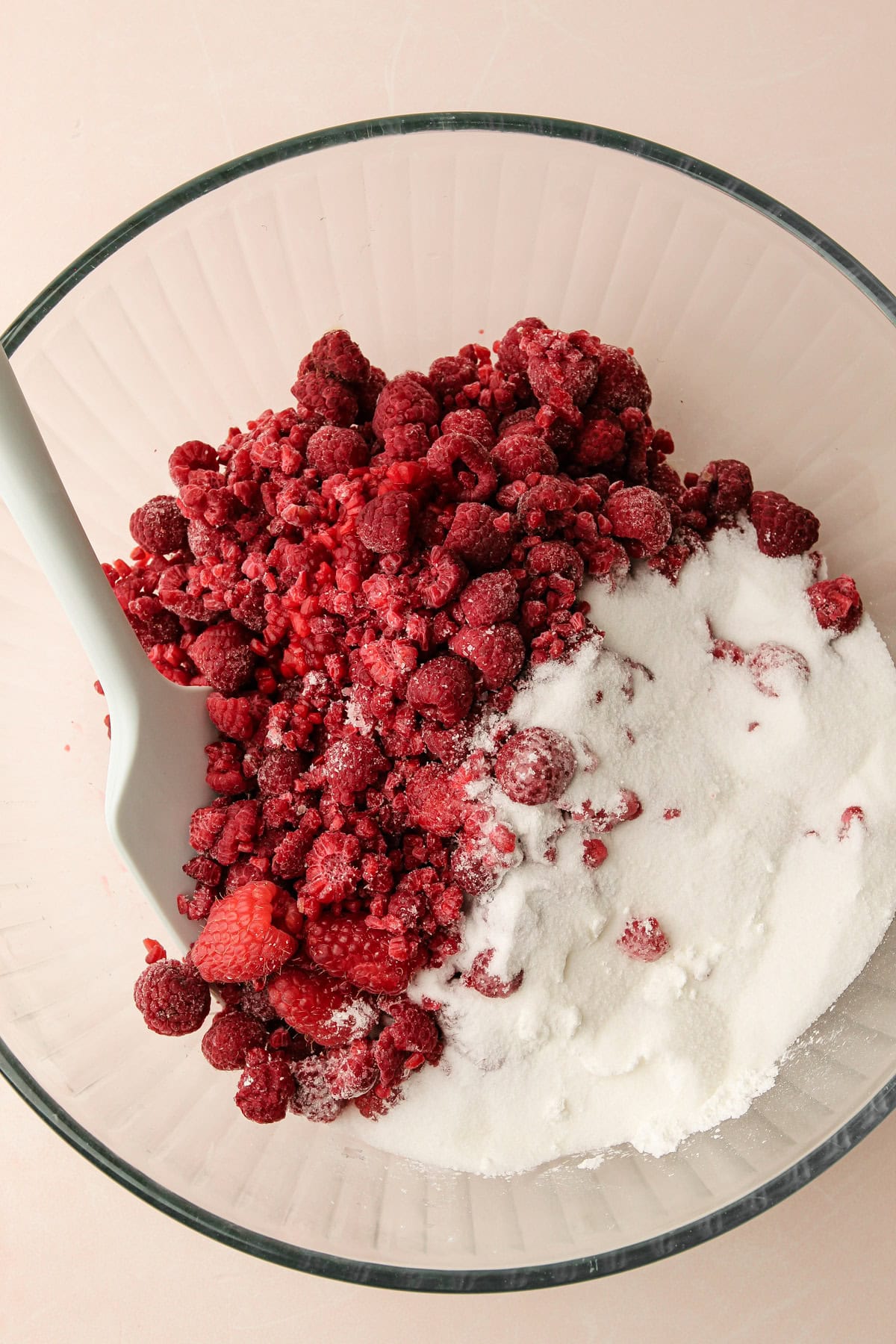 Making a raspberry pie filling.