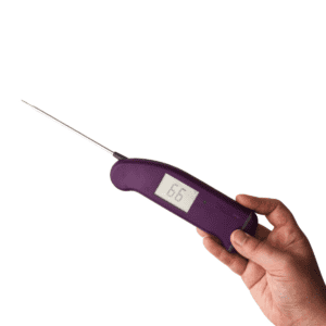 A purple digital thermometer.