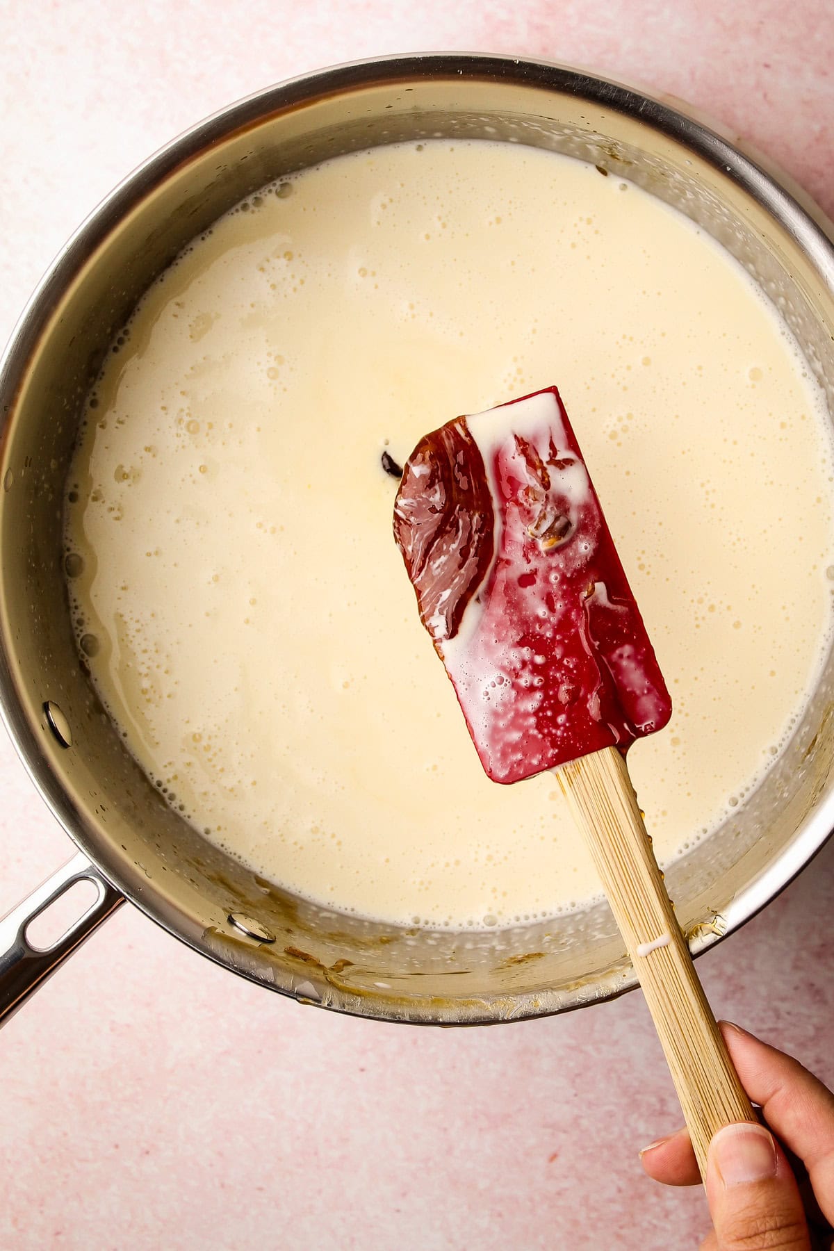 A pot with the ingredients for maple ice cream, and some hardened maple syrup that will soon melt.